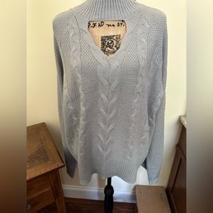 Gray sweater with bell sleeves